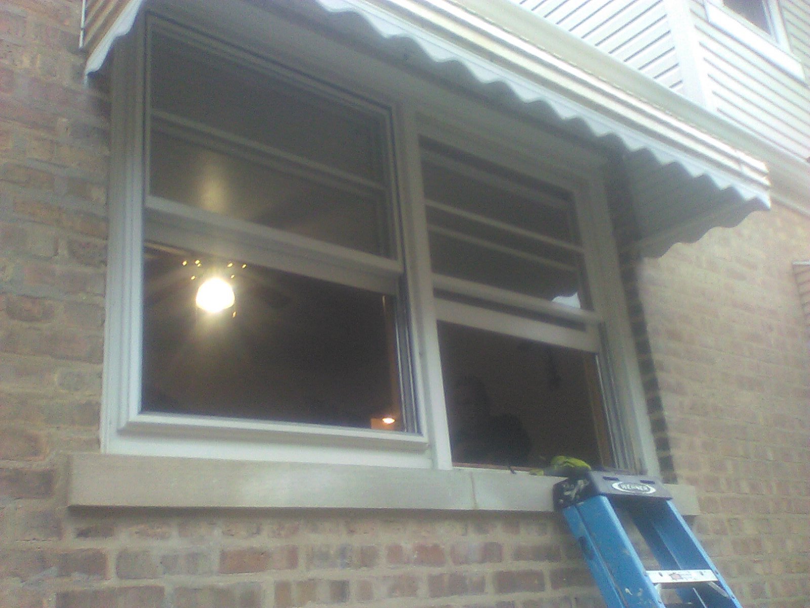 Two Double Hung Windows Being Replaced In Chicago