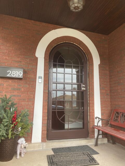 Round-Top Entry and Storm Door With Decorative Glass